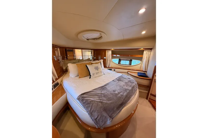 Slide: The Image of Luxurious bedroom interior of 2008 Azimut 62 yacht with cozy bedding and elegant design. - 43