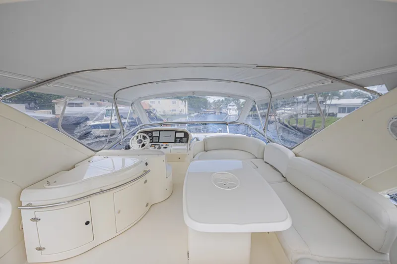Slide: The Image of Luxurious interior of 2008 Azimut 62 yacht with elegant seating and helm station. - 4