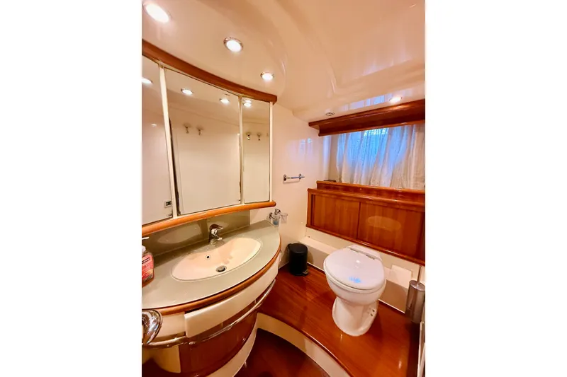 Slide: The Image of Luxurious bathroom in 2008 Azimut 62 yacht with elegant wood finishes. - 61