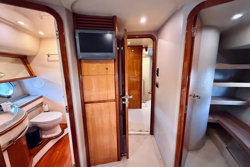 Slide: The Image of Luxurious interior of a 2008 Azimut 62 yacht featuring a bathroom and wooden cabinetry. - 45