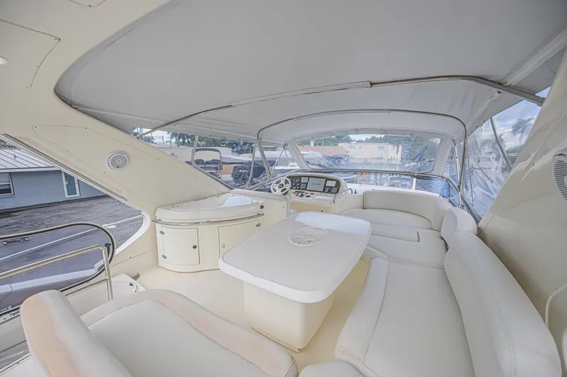 Slide: The Image of Luxurious interior of a 2008 Azimut 62 yacht with plush seating and helm. - 5