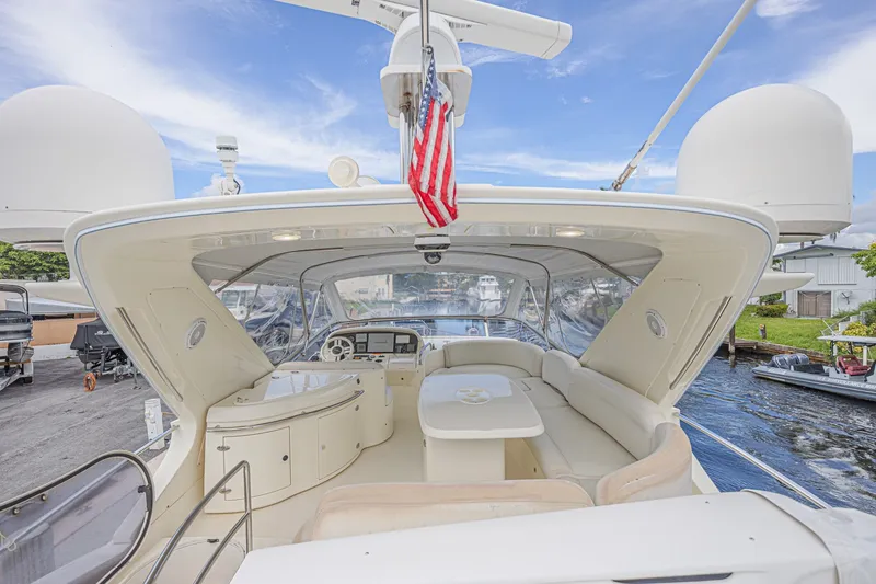 Slide: The Image of Luxurious 2008 Azimut 62 yacht with spacious deck and elegant seating area. - 6