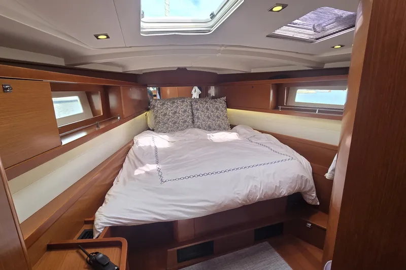 Slide: The Image of Luxurious cabin interior of 2012 Beneteau Oceanis 45 yacht with cozy bedding. - 18