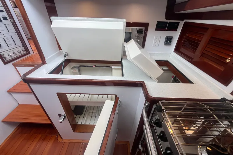 Slide: The Image of Luxurious 2008 Bruckmann 50 MKII yacht kitchen with modern appliances and wooden accents. - 33
