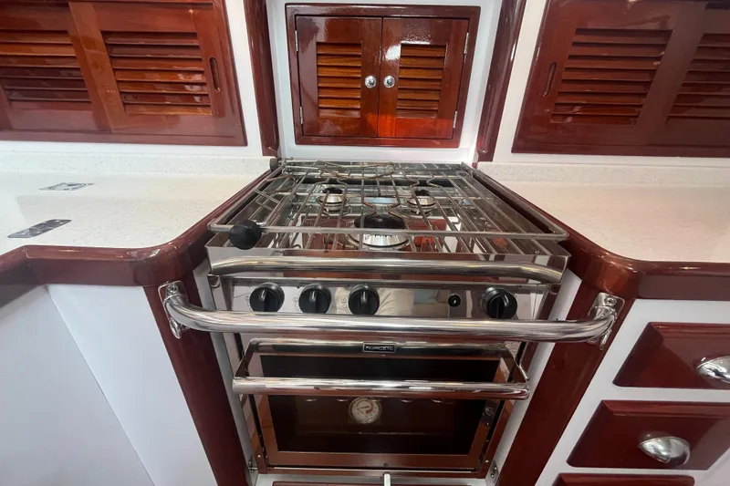 Slide: The Image of Stainless steel stove in 2008 Bruckmann 50 MKII yacht kitchen with wooden cabinetry. - 31