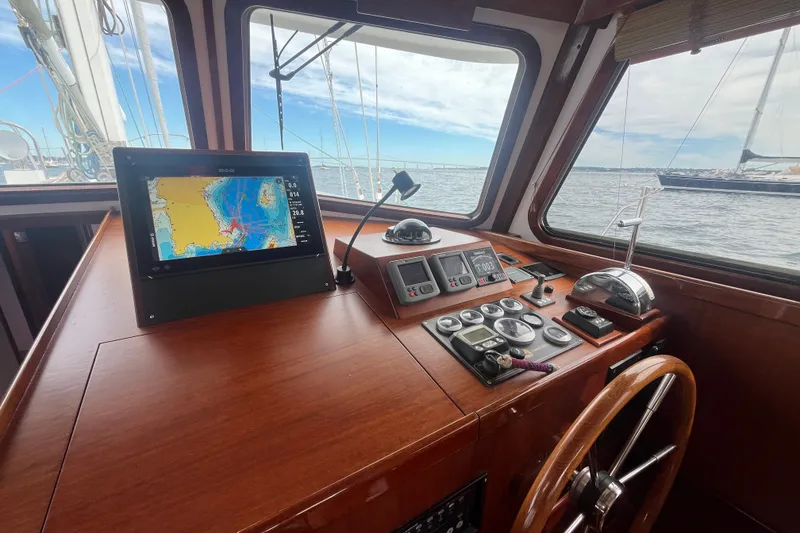 Slide: The Image of Helm of 2008 Bruckmann 50 MKII yacht with navigation equipment and ocean view. - 38