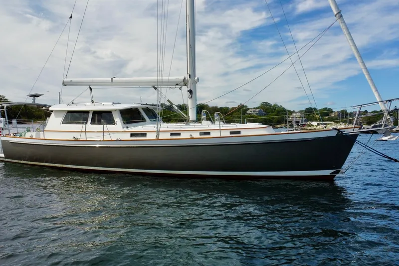 Slide: The Image of 2008 Bruckmann 50 MKII sailboat on calm water, showcasing sleek design and modern features. - 1