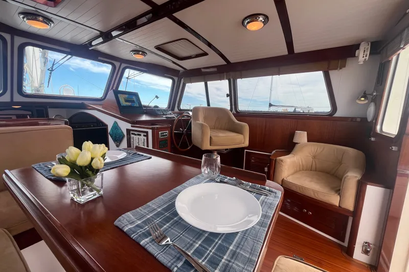 Slide: The Image of Luxurious interior of 2008 Bruckmann 50 MKII yacht with elegant dining setup. - 36