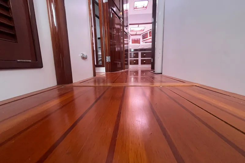 Slide: The Image of Interior view of 2008 Bruckmann 50 MKII yacht with polished wooden flooring. - 55