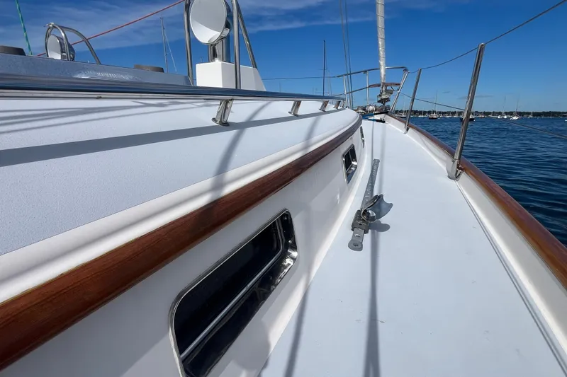 Slide: The Image of Sleek 2008 Bruckmann 50 MKII yacht deck with polished wood trim and ocean view. - 53