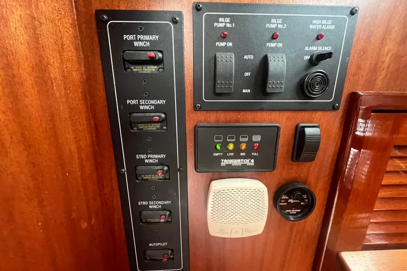 Slide: The Image of Control panel of a 2008 Bruckmann 50 MKII yacht with winch and bilge pump switches. - 63