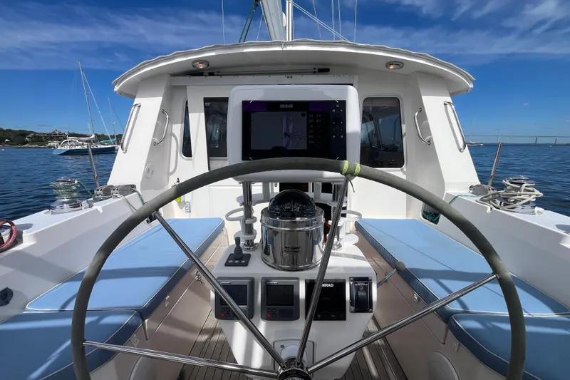 Slide: The Image of Cockpit view of 2008 Bruckmann 50 MKII yacht with steering wheel and navigation equipment. - 45
