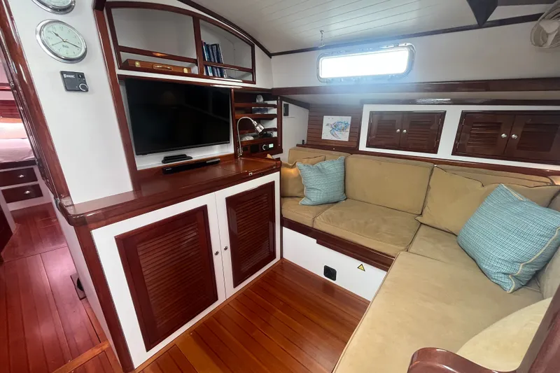 Slide: The Image of Luxurious 2008 Bruckmann 50 MKII yacht interior with cozy seating and elegant wood finishes. - 23