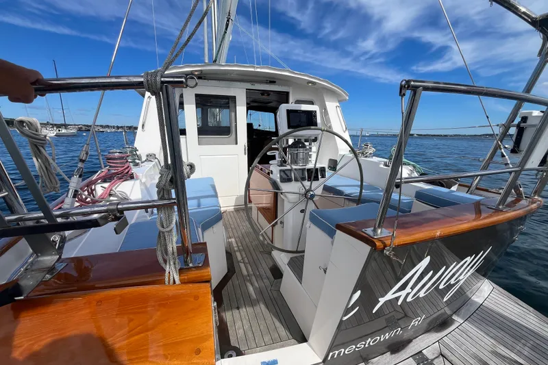 Slide: The Image of Sailing yacht Bruckmann 50 MKII, 2008 model, with helm and cockpit view on open water. - 48