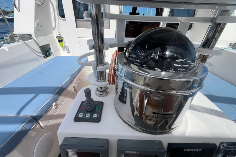 Slide: The Image of Cockpit of 2008 Bruckmann 50 MKII yacht with compass and control panel. - 73