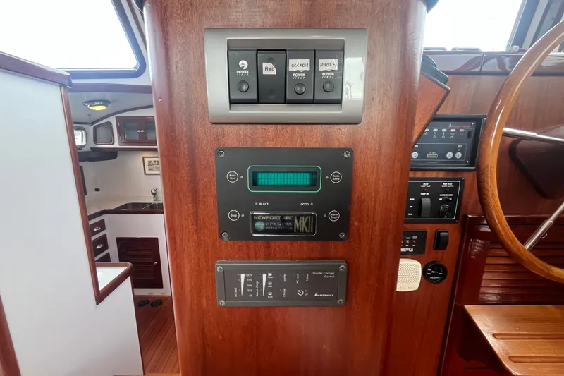 Slide: The Image of Control panel of a 2008 Bruckmann 50 MKII yacht interior with wooden finish. - 64