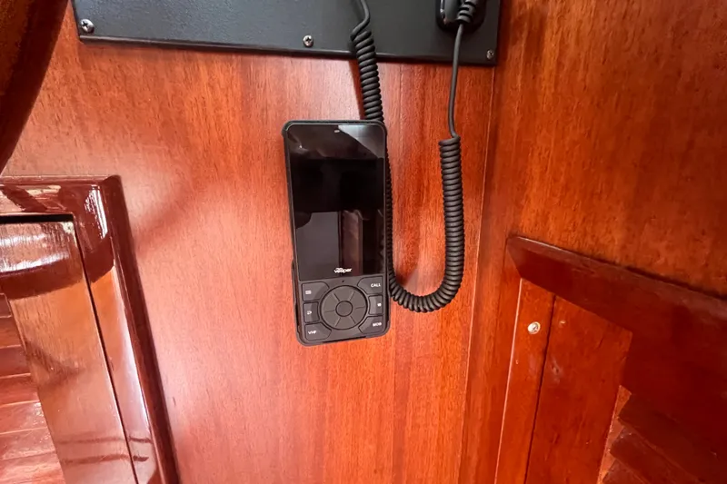 Slide: The Image of Vesper Marine radio mounted on wooden panel of 2008 Bruckmann 50 MKII yacht. - 60
