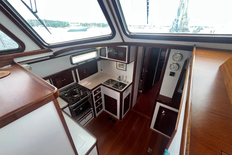Slide: The Image of Interior of 2008 Bruckmann 50 MKII yacht with kitchen and wooden finishes. - 41