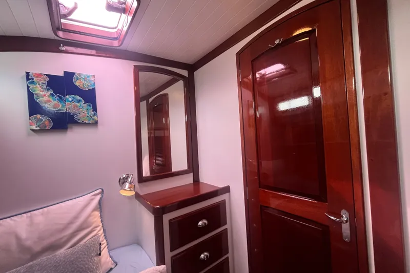 Slide: The Image of Luxurious cabin interior of 2008 Bruckmann 50 MKII yacht with wooden finishes and artwork. - 20