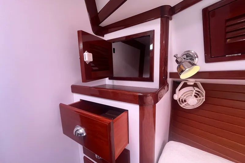 Slide: The Image of Interior of 2008 Bruckmann 50 MKII yacht with wooden cabinetry and lighting. - 9