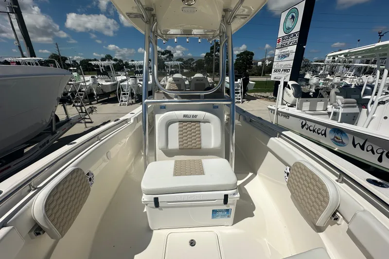 Slide: The Image of 2027 Bulls Bay 255 Center Console boat interior with seating and storage. - 10