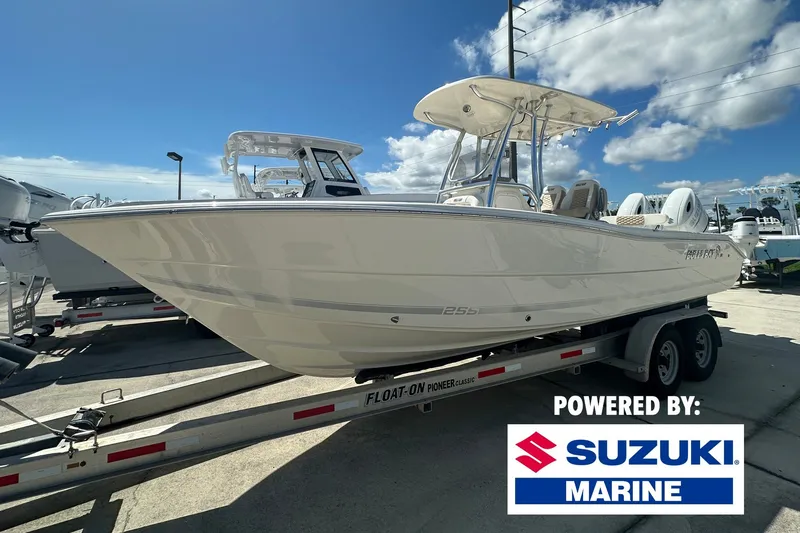 The Image of 2027 Bulls Bay 255 Center Console boat on trailer, powered by Suzuki Marine. - 1