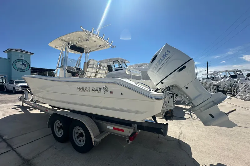 Slide: The Image of 2027 Bulls Bay 255 Center Console boat on trailer with Suzuki outboard motor. - 5
