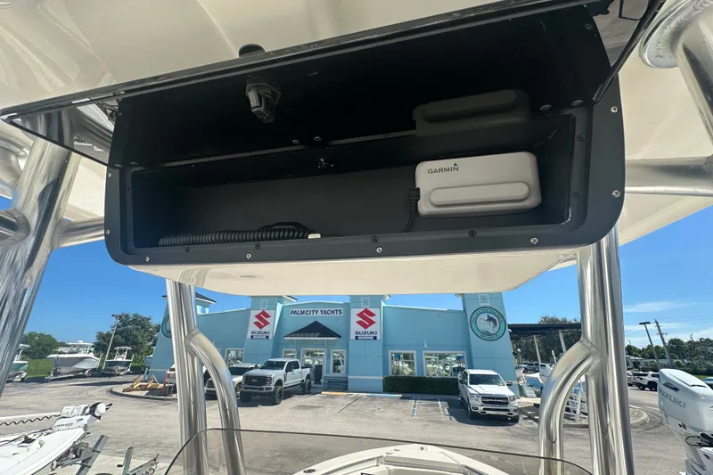 Slide: The Image of 2027 Bulls Bay 255 Center Console boat with Garmin equipment, parked at Palm City Yachts. - 8