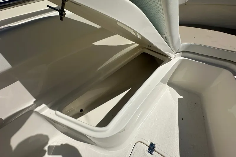 Slide: The Image of Open storage compartment on 2027 Bulls Bay 255 Center Console boat. - 12