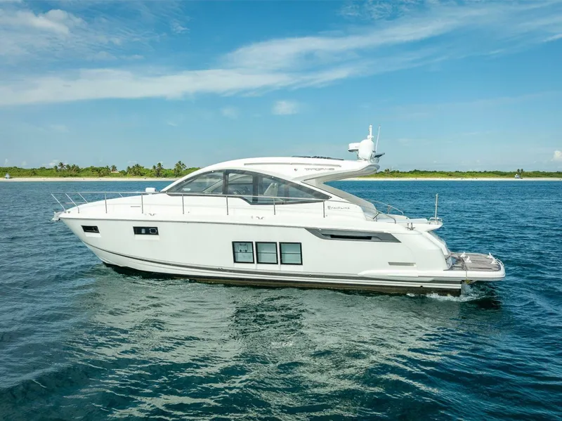 The Image of 2015 Fairline Targa 48 Open yacht cruising on calm blue waters. - 0