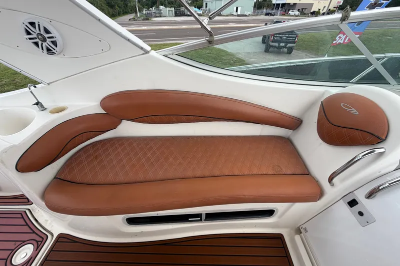 Slide: The Image of Luxurious seating on 2003 Maxum 2900 SE boat with brown leather upholstery. - 29