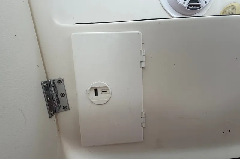 Slide: The Image of White hatch door on a 2003 Maxum 2900 SE boat interior. - 92
