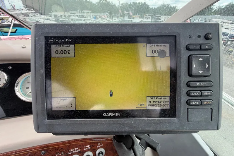 Slide: The Image of Garmin GPS display on 2003 Maxum 2900 SE boat, showing speed and position. - 36