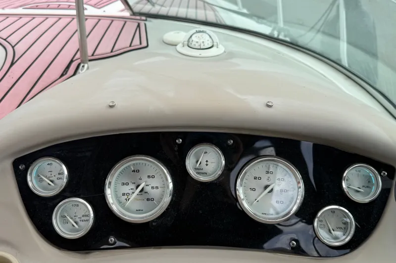 Slide: The Image of Dashboard of a 2003 Maxum 2900 SE boat with gauges and controls. - 37