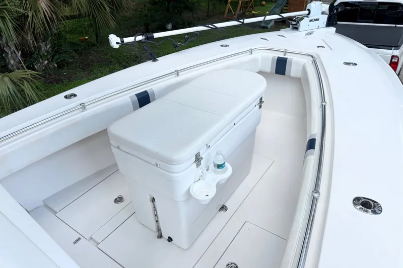 Slide: The Image of 2007 Contender 23 Tournament boat interior with seating and storage. - 12