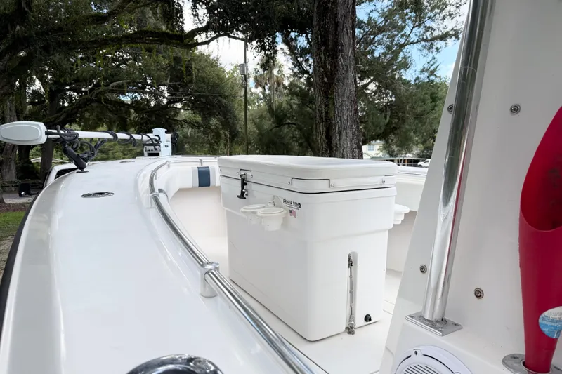 Slide: The Image of 2007 Contender 23 Tournament boat deck with cooler and trolling motor. - 17