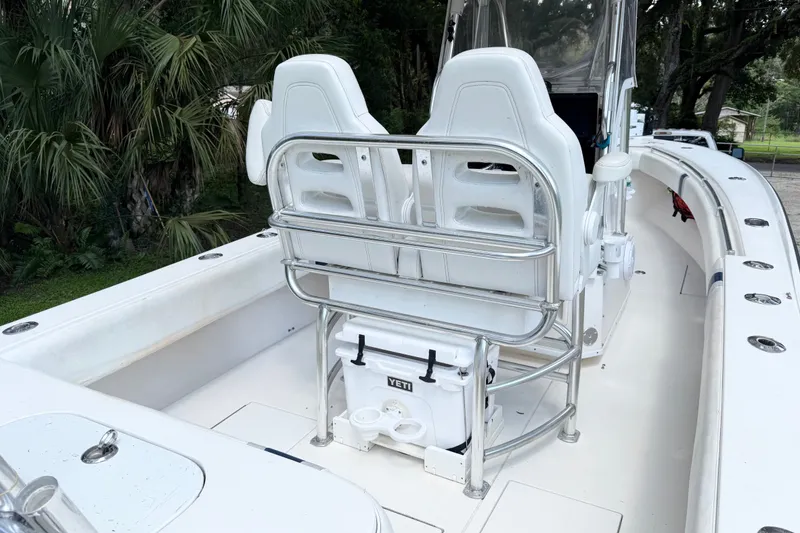 Slide: The Image of 2007 Contender 23 Tournament boat interior with dual seats and Yeti cooler. - 14