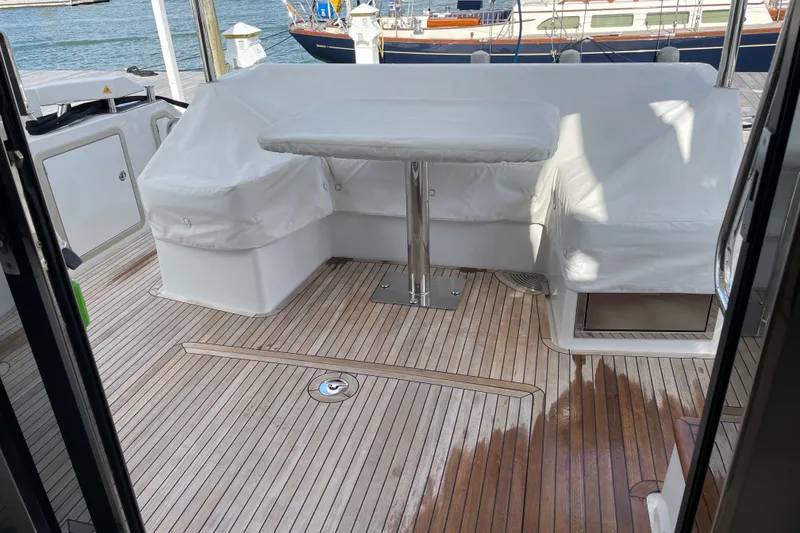 Slide: The Image of Cockpit seating and dining with mooring covers. - 37