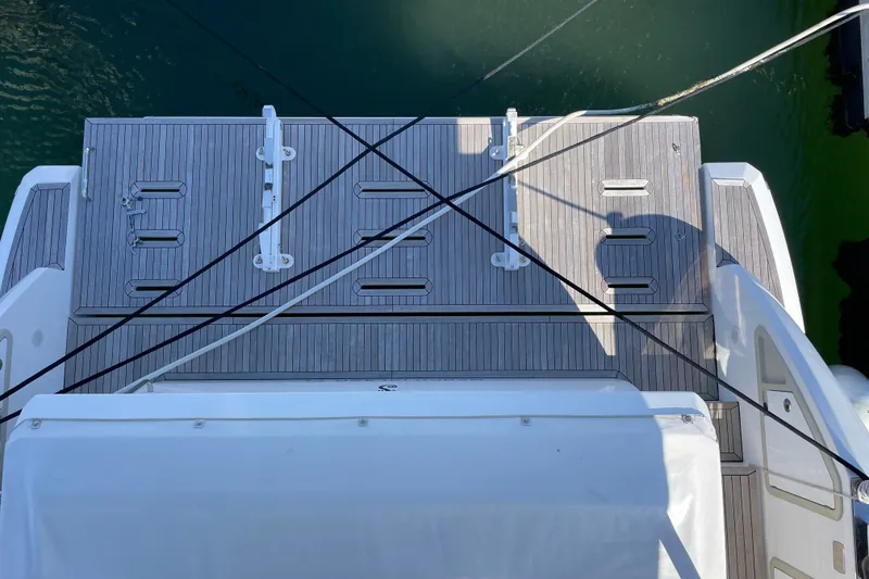 Slide: The Image of 2023 Azimut Fly 50 yacht hydraulic dingly lift/swim platform. AB Inflatable with 25 HP Yamaha included. - 20