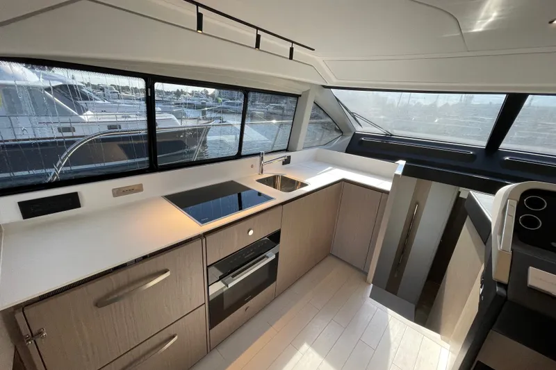 Slide: The Image of Galley up with Meile appliances. - 22