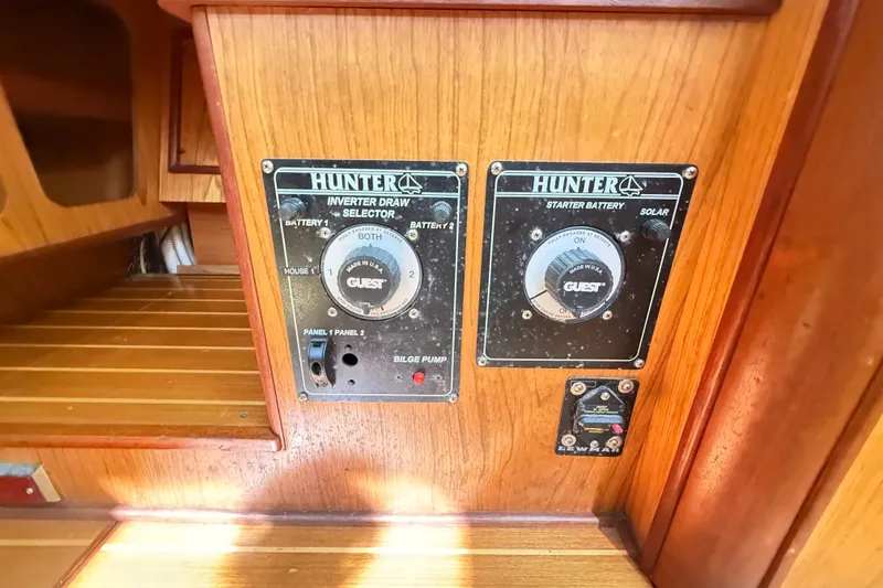 Slide: The Image of Control panel of a 2000 Hunter 460 yacht with inverter and battery selectors. - 47