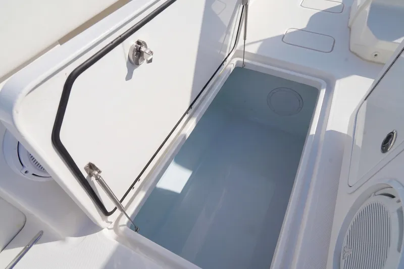 Slide: The Image of Open storage compartment on 2019 Invincible 37 Catamaran boat deck. - 26