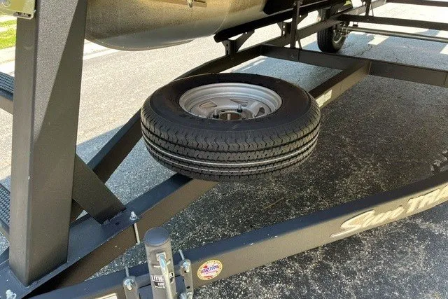 Slide: The Image of Trailer with spare tire for 2026 Sun Tracker Bass Buggy 18 DLX boat. - 20