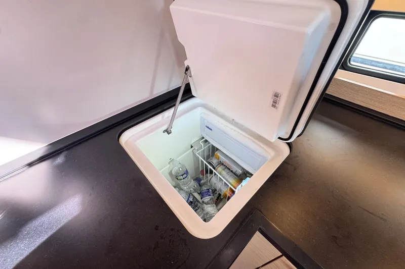 Slide: The Image of Built-in cooler on Hanse 460 yacht, 2025 model, with beverages inside. - 17