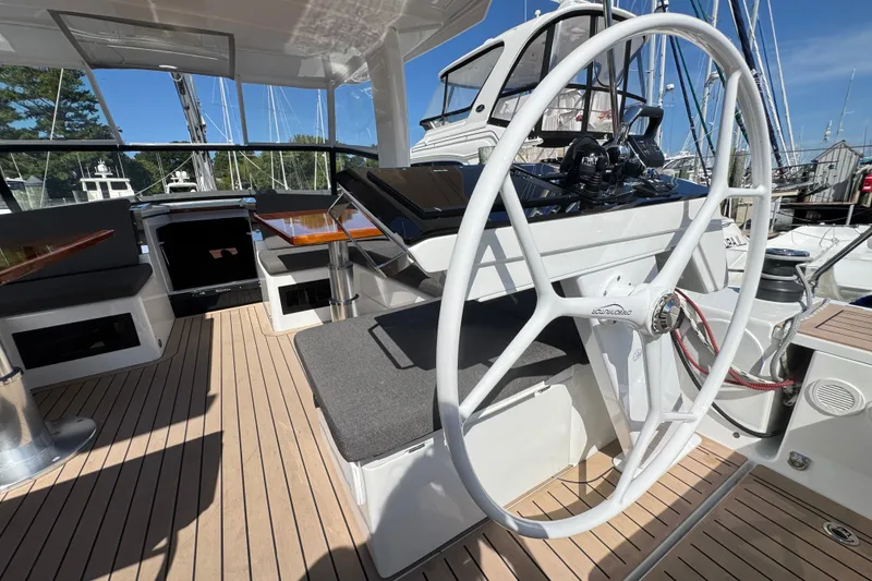 Slide: The Image of 2025 Hanse 460 yacht cockpit with steering wheel and modern design elements. - 9