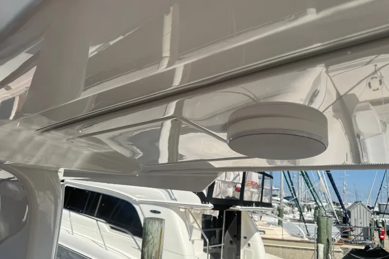 Slide: The Image of Close-up of a 2025 Hanse 460 yacht's sleek exterior with a mounted speaker. - 13