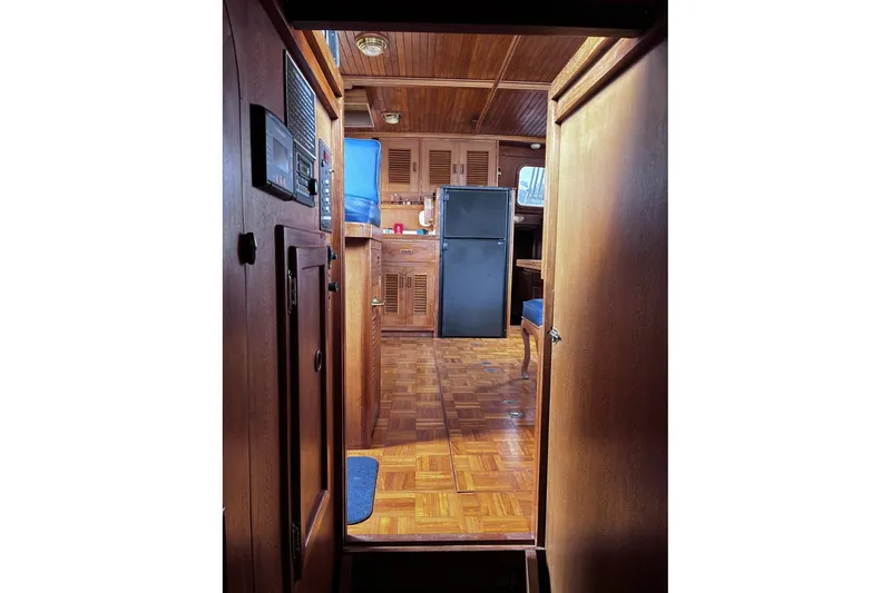 Slide: The Image of Interior view of 1979 Ocean Alexander 40 Double Cabin with wood paneling and parquet flooring. - 45