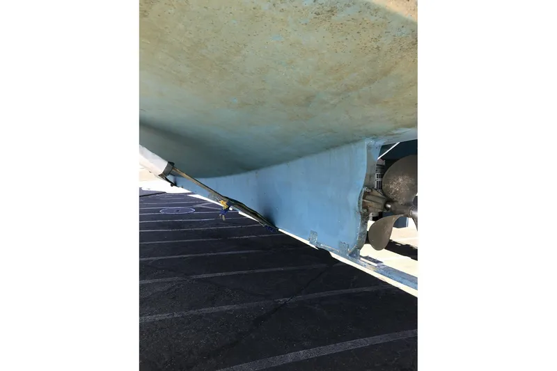 Slide: The Image of Bottom view of 1979 Ocean Alexander 40 Double Cabin boat hull and propeller. - 69