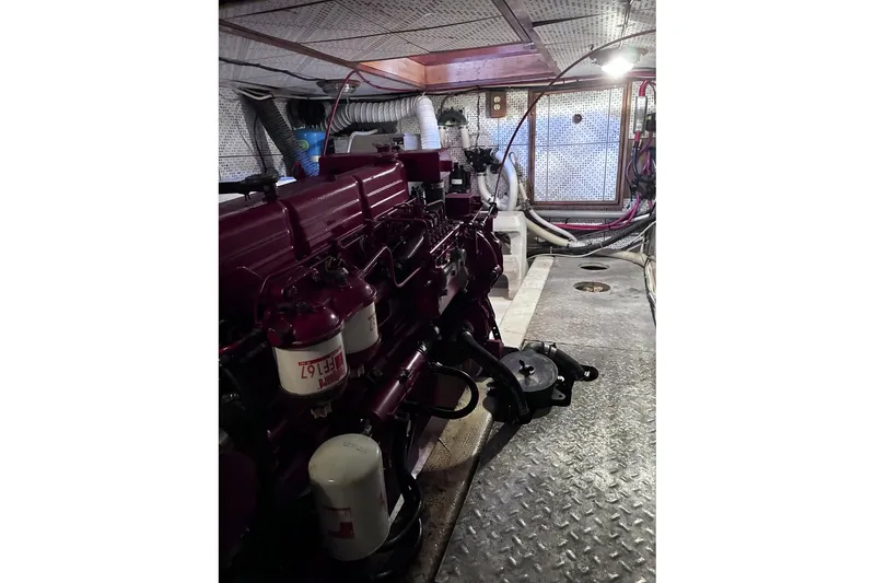 Slide: The Image of Engine room of 1979 Ocean Alexander 40 Double Cabin yacht, showcasing mechanical components. - 46