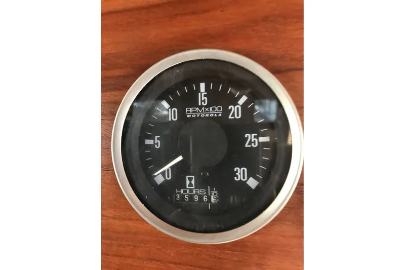 Slide: The Image of Tachometer of 1979 Ocean Alexander 40 Double Cabin, showing 3596 hours. - 22